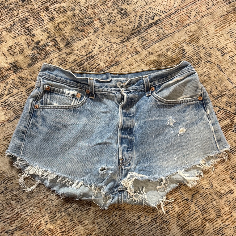 Vintage Blue Distressed Levi Shorts with Raw Hem